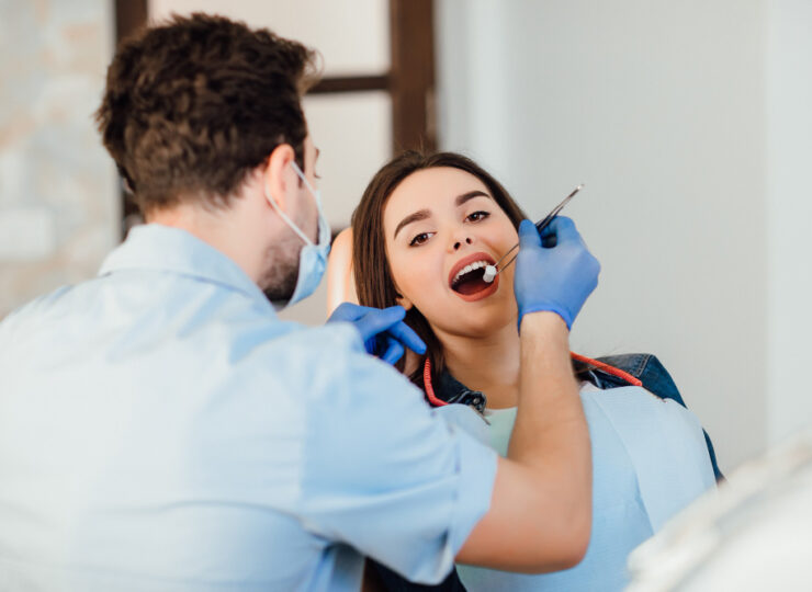 Dentist Making Professional Teeth Cleaning Withb Cotton Female Young Patient Dental Office